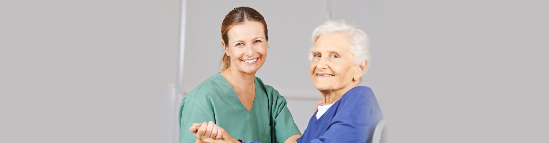 nurse smiling with the senior woman
